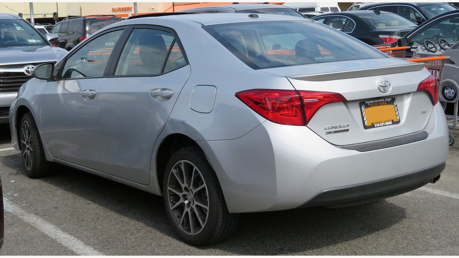 A silver Toyota Corolla parked among other cars. Illustrative file photograph, not a vehicle offered for sale here.